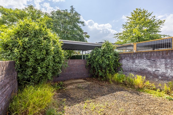 Foto - Te koop: Tussenwoning uit 2007 voorzien van een energielabel A met onder meer een ruime woon- en eetkamer, semi-open keuken, 3 slaapkamers, badkamer, carport en besloten (voor)tuin in Ransdaal